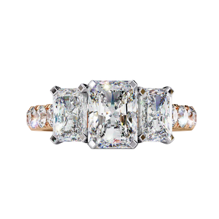 Front view of a rose gold radiant cut three-stone diamond engagement ring.