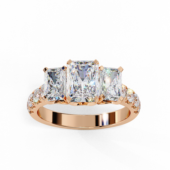 Top-down view of a rose gold radiant cut three-stone diamond engagement ring highlighting the horizontal stone alignment.