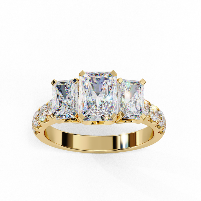 Top-down view of a yellow gold radiant cut three-stone diamond engagement ring highlighting the horizontal stone alignment.