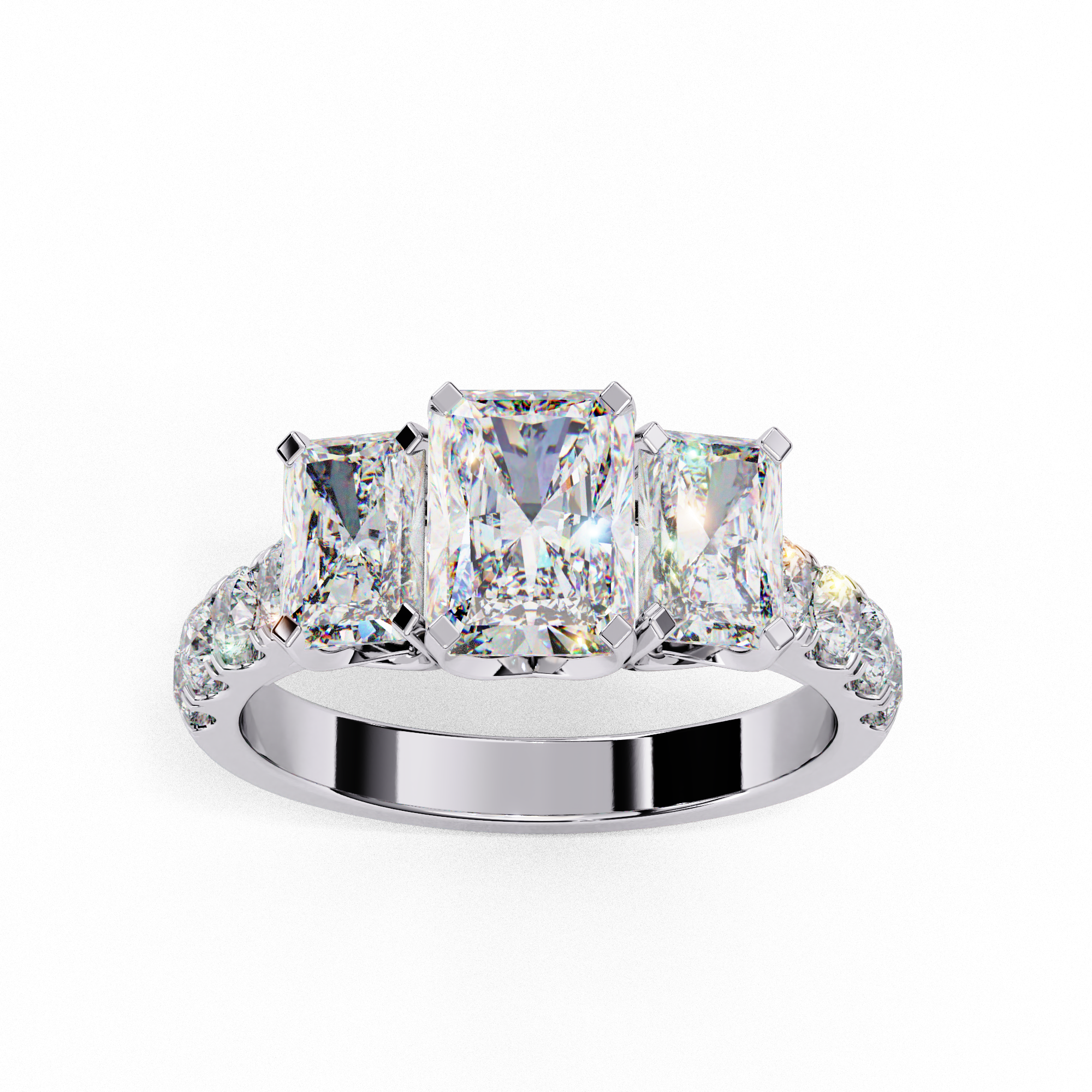 Top-down view of a white gold radiant cut three-stone diamond engagement ring highlighting the horizontal stone alignment.