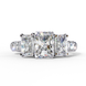 Front view of a white gold radiant cut three-stone diamond engagement ring.
