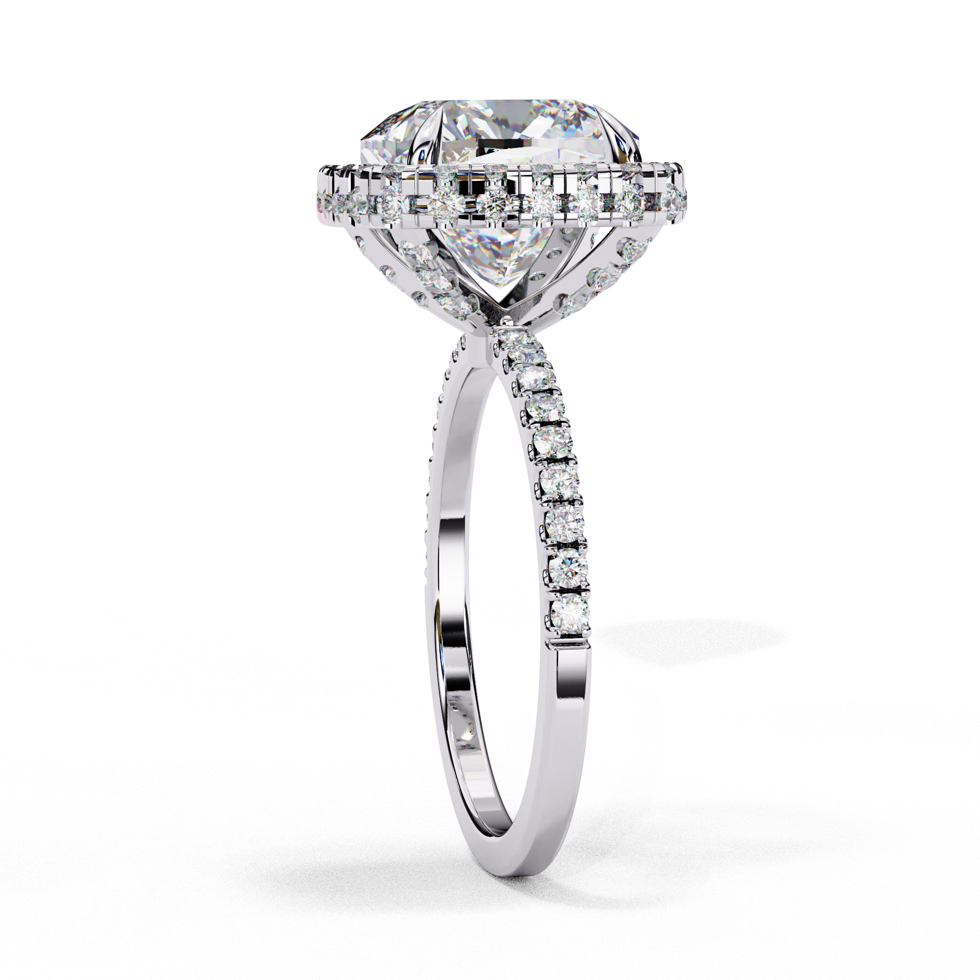 Close-up angled shot of a white gold cushion cut diamond double halo engagement ring highlighting the pavé shoulders.