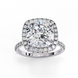 Top-down view of a white gold cushion cut diamond engagement ring with a brilliant double halo.