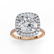 Top-down view of a rose gold cushion cut diamond engagement ring with a brilliant double halo.
