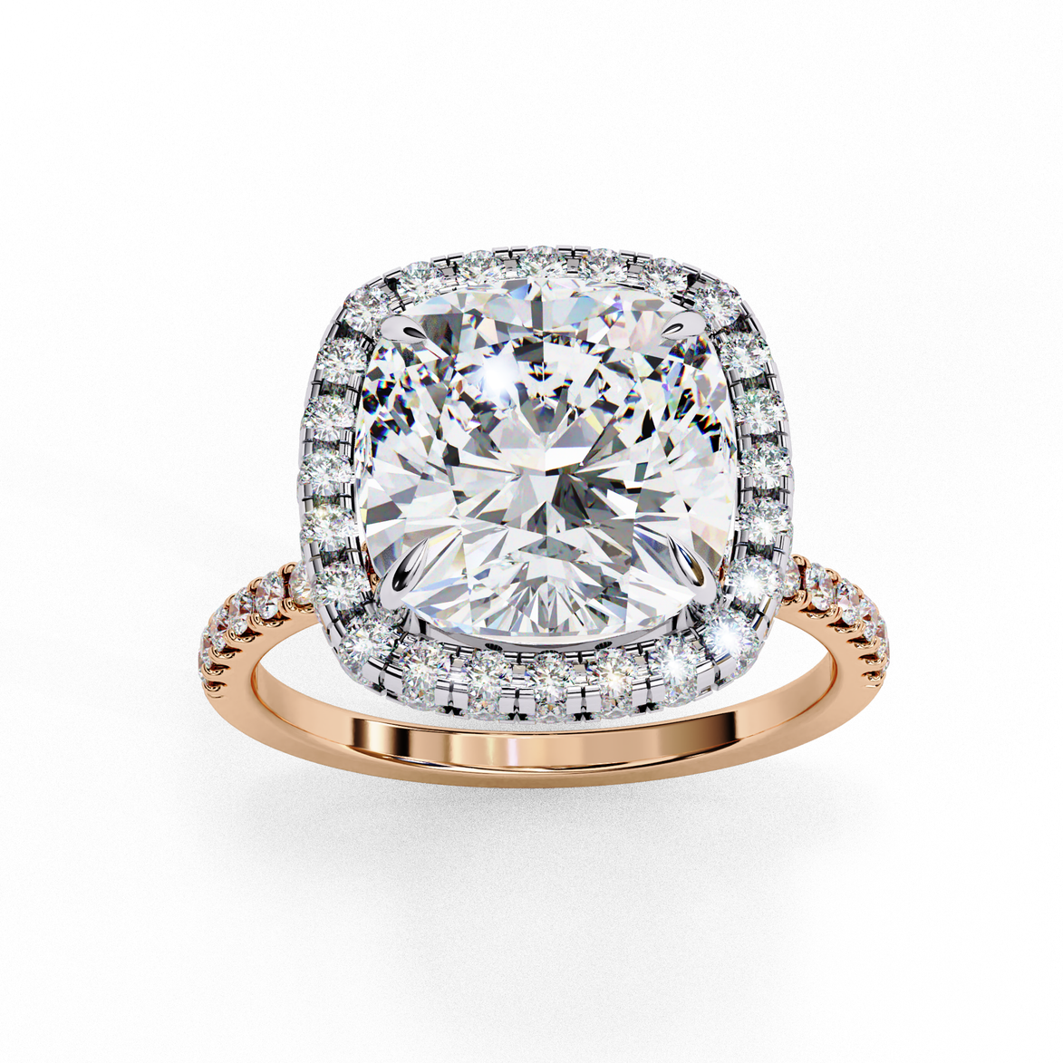 Top-down view of a rose gold cushion cut diamond engagement ring with a brilliant double halo.