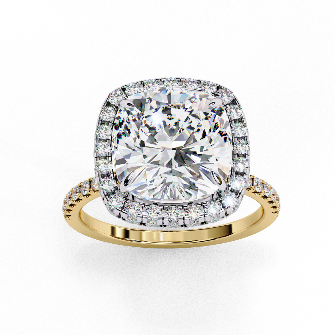 Top-down view of a yellow gold cushion cut diamond engagement ring with a brilliant double halo.