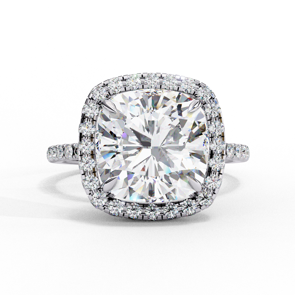 Front view of a white gold cushion cut diamond double halo engagement ring.