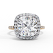 Front view of a rose gold cushion cut diamond double halo engagement ring.