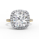 Front view of a yellow gold cushion cut diamond double halo engagement ring.