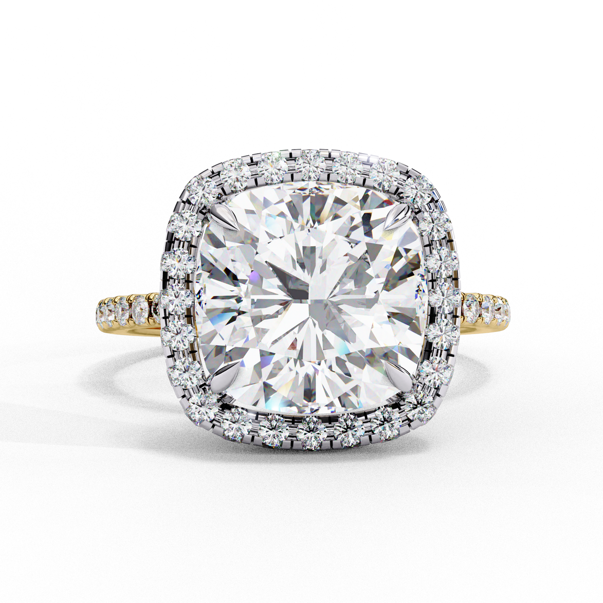 Front view of a yellow gold cushion cut diamond double halo engagement ring.