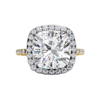 Front view of a yellow gold cushion cut diamond double halo engagement ring.