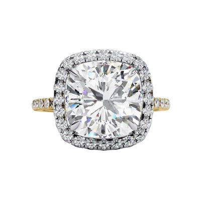 Front view of a yellow gold cushion cut diamond double halo engagement ring.