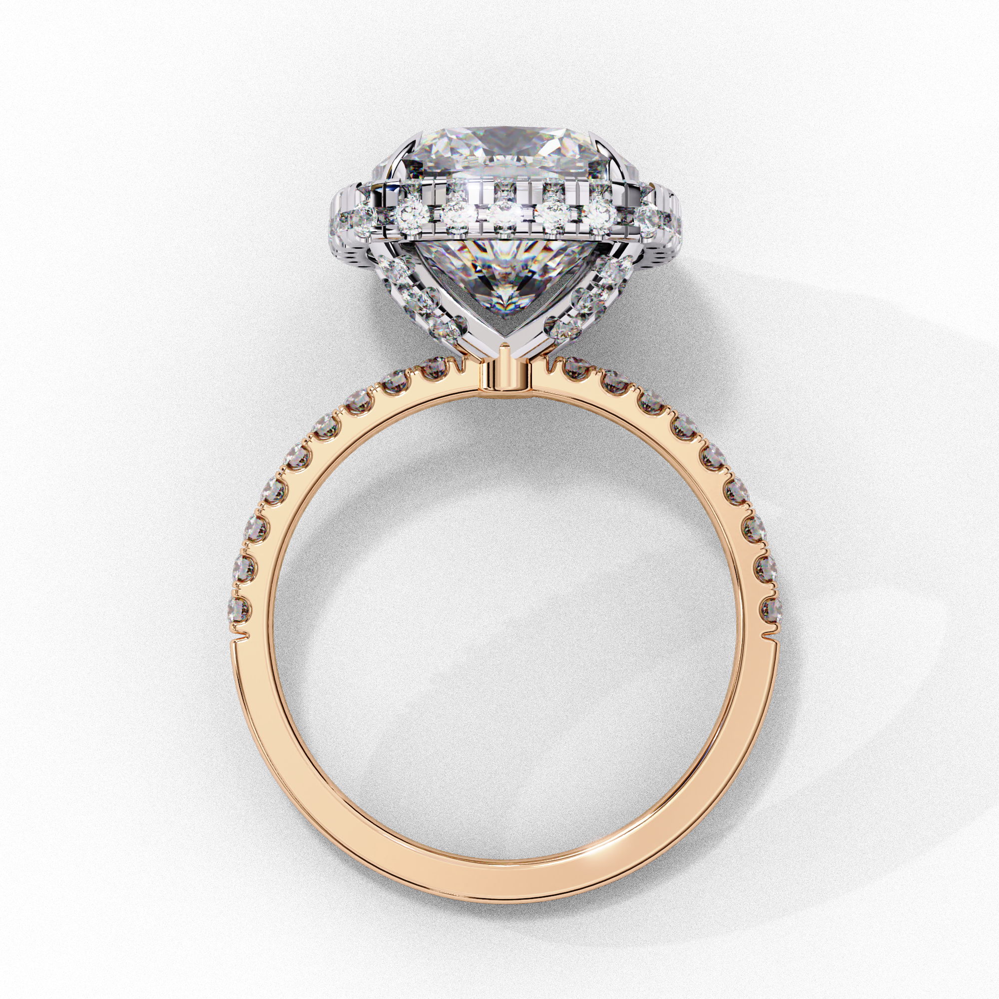 Side profile view of a rose gold cushion cut diamond double halo engagement ring showing the elevated cathedral setting.