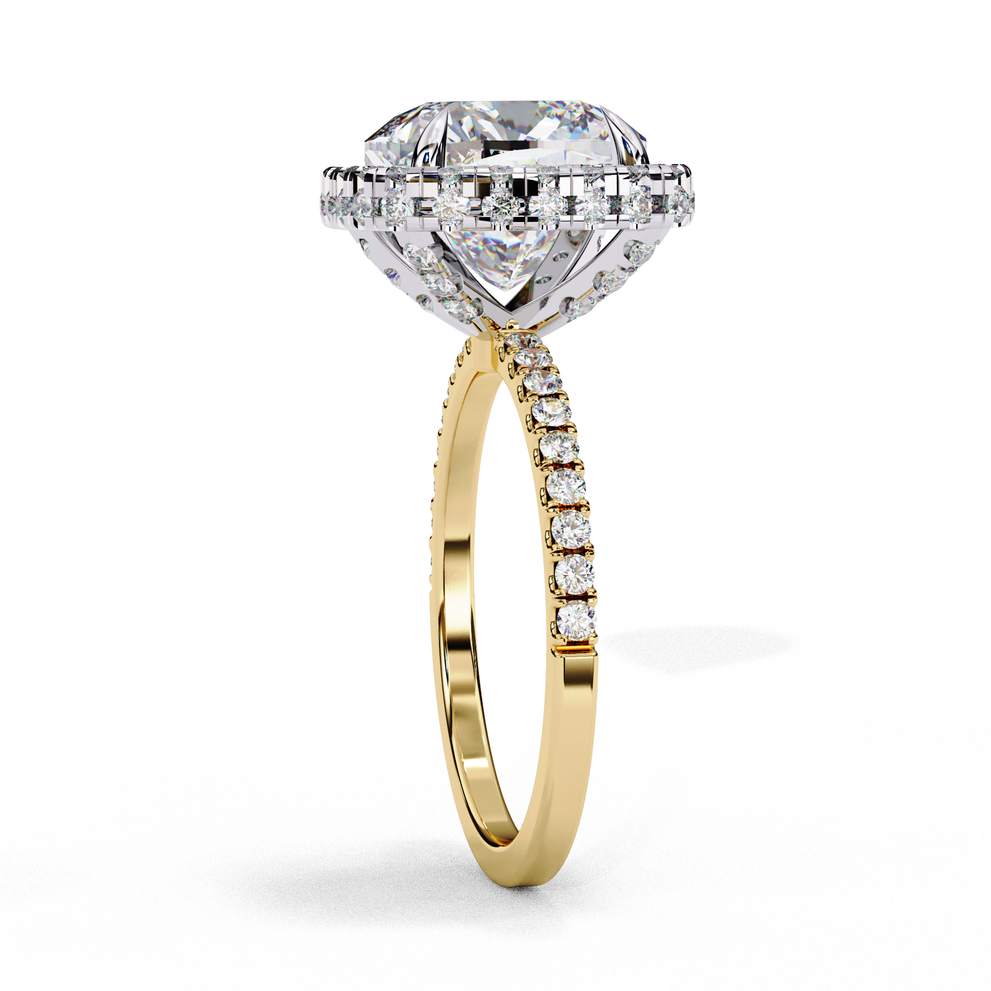 Close-up angled shot of a yellow gold cushion cut diamond double halo engagement ring highlighting the pavé shoulders.