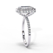 Side profile view of a white gold emerald cut diamond ring showing the diamond-accented pavé band.