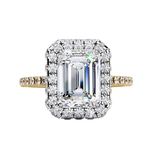 Top-down view of a yellow gold emerald cut diamond engagement ring with a brilliant double halo.