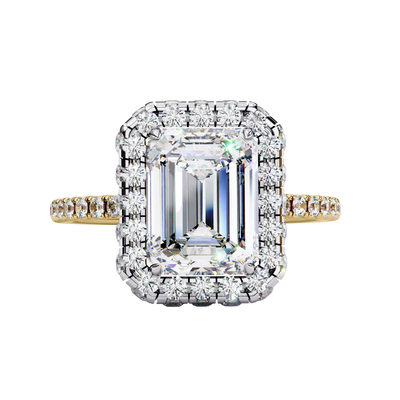 Top-down view of a yellow gold emerald cut diamond engagement ring with a brilliant double halo.