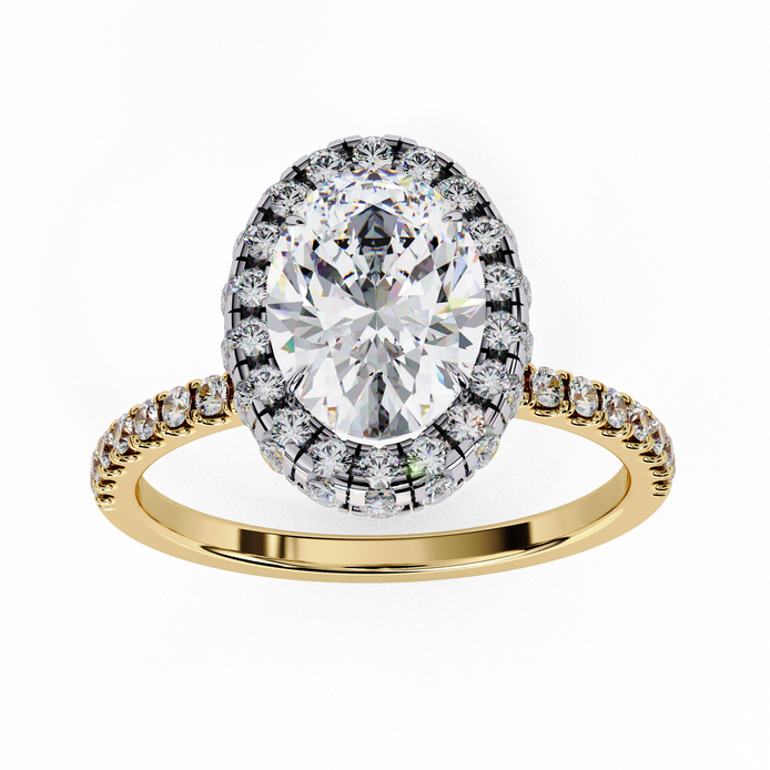 Top-down view of a yellow gold oval cut diamond engagement ring with a brilliant double halo.