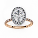 Top-down view of a rose gold oval cut diamond engagement ring with a brilliant double halo.