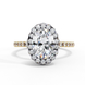 Front view of a yellow gold oval cut diamond double halo engagement ring.
