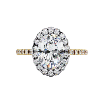 Front view of a yellow gold oval cut diamond double halo engagement ring.