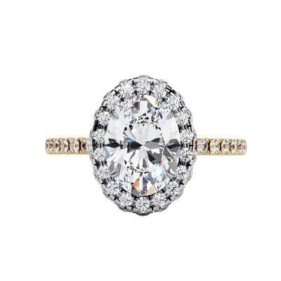 Front view of a yellow gold oval cut diamond double halo engagement ring.