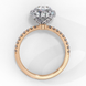 Side profile view of a rose gold oval cut diamond double halo engagement ring showing the cathedral setting.