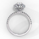 Side profile view of a white gold oval cut diamond double halo engagement ring showing the cathedral setting.