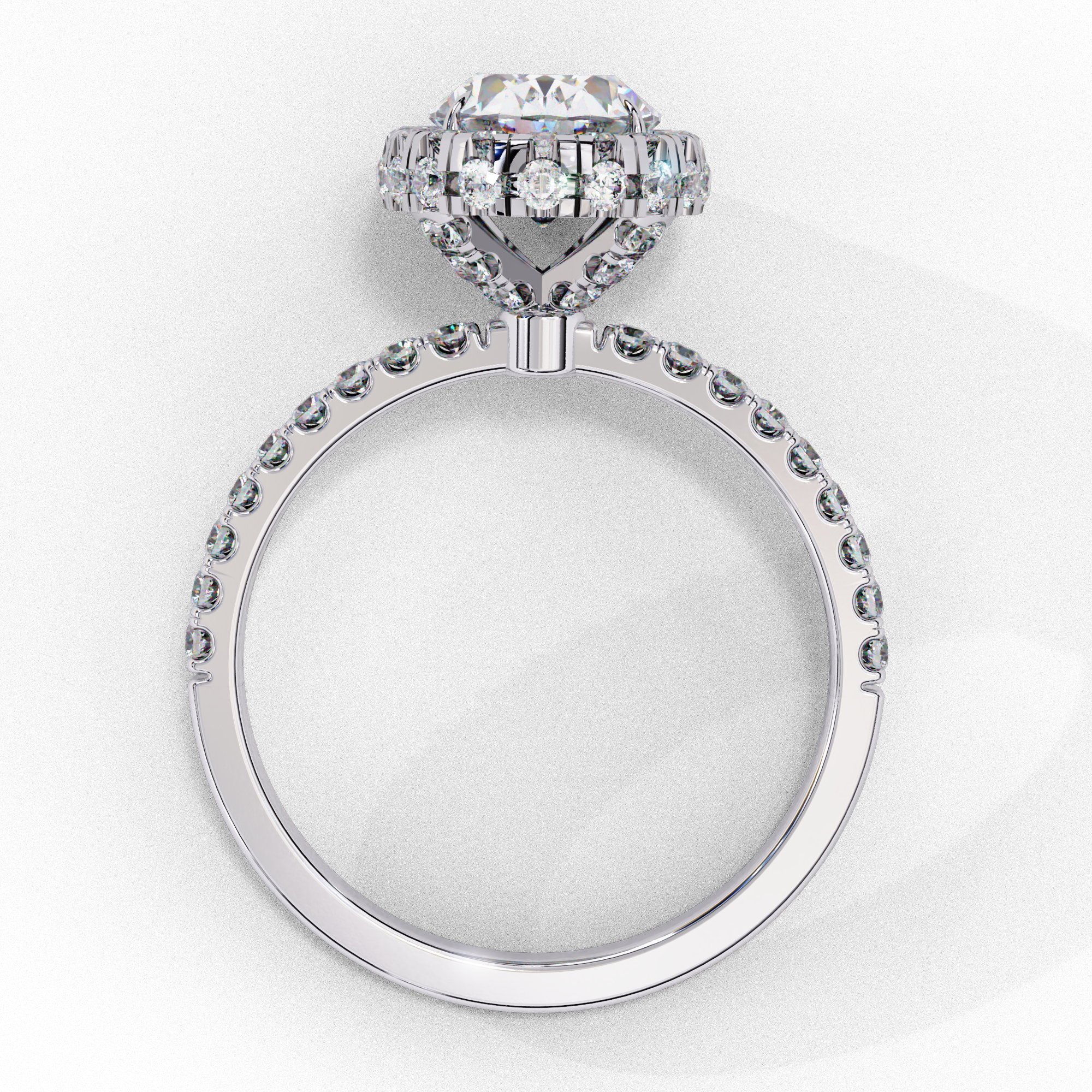 Side profile view of a white gold oval cut diamond double halo engagement ring showing the cathedral setting.