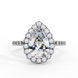 Top-down view of a white gold pear shaped diamond engagement ring with a brilliant halo frame.