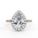 Top-down view of a rose gold pear shaped diamond engagement ring with a brilliant halo frame.