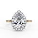 Top-down view of a yellow gold pear shaped diamond engagement ring with a brilliant halo frame.