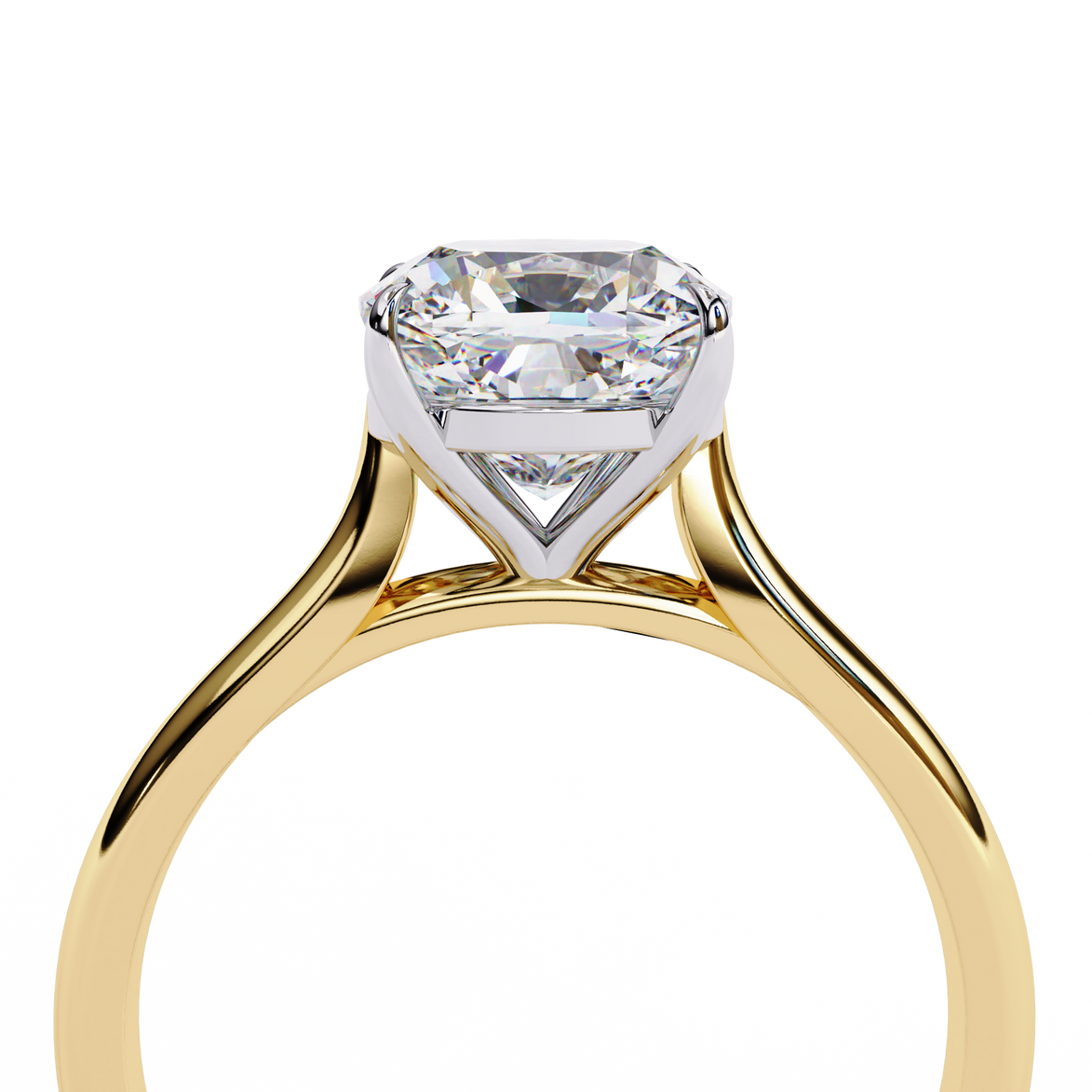Close-up angled shot from beneath the basket of a yellow gold round brilliant cut diamond solitaire ring.