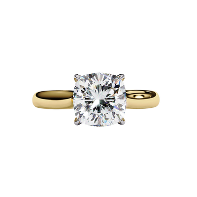 Front view of a yellow gold round brilliant cut diamond solitaire engagement ring.