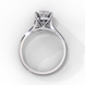 Side profile view of a white gold round brilliant cut diamond solitaire ring showing a classic four-prong head.