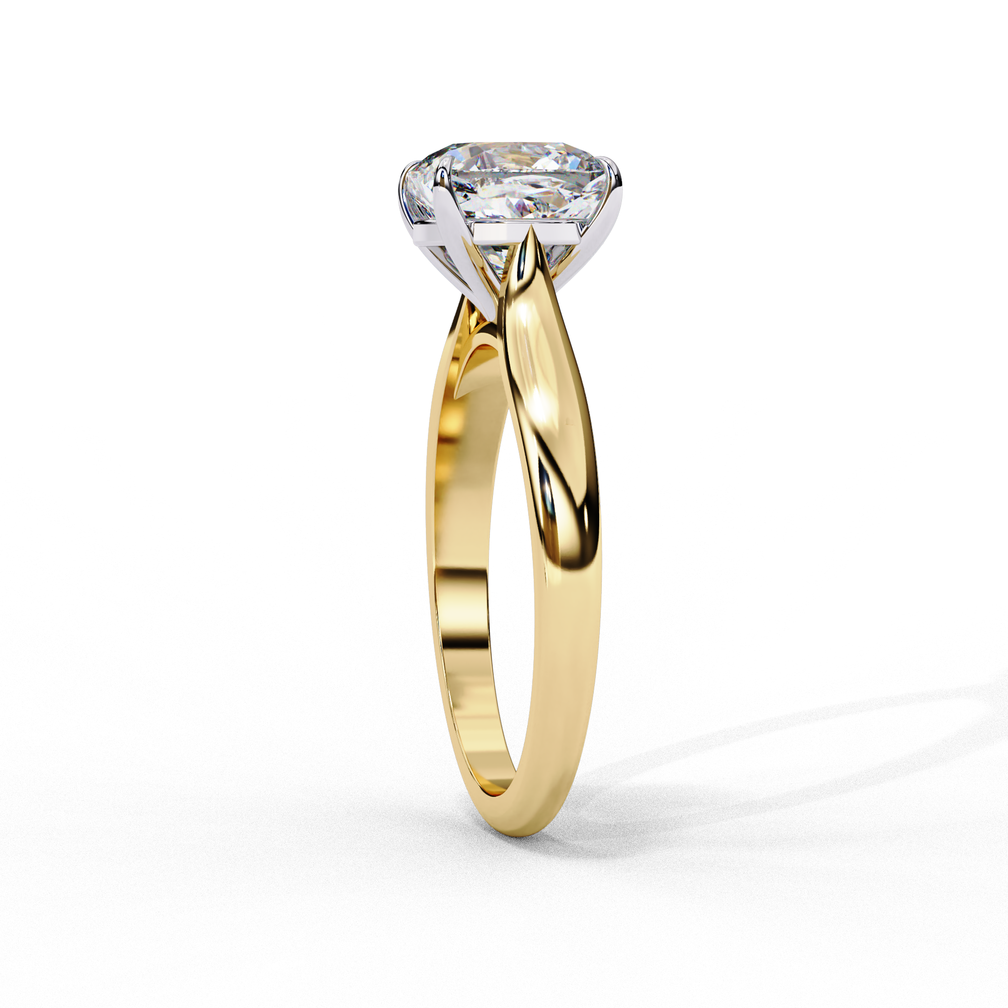 Side profile of a yellow gold round brilliant cut diamond solitaire ring emphasizing the slim elegant band.