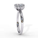 Side profile view of a white gold oval cut diamond engagement ring showcasing the elevated cathedral gallery profile.