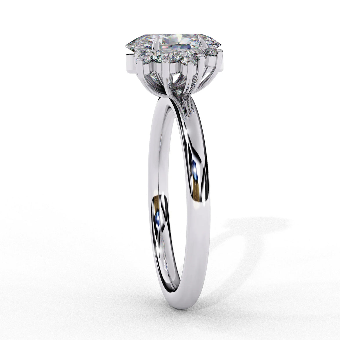 Side profile view of a white gold oval cut diamond engagement ring showcasing the elevated cathedral gallery profile.