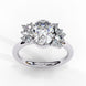 Side profile view of a rose gold oval cut diamond engagement ring showcasing the elevated cathedral gallery profile.