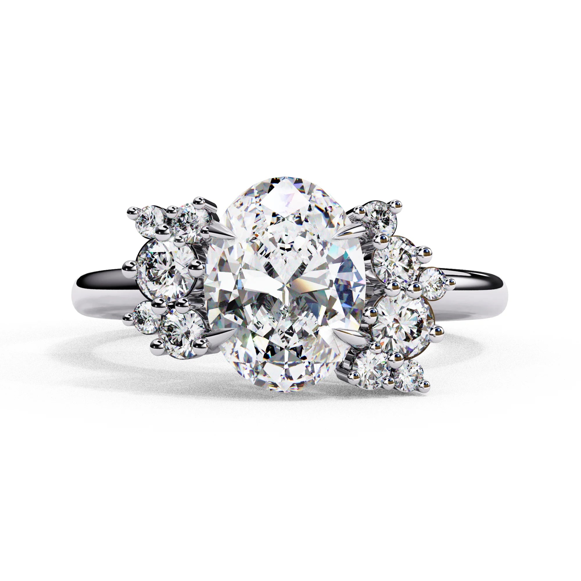 Front view of a white gold oval cut diamond engagement ring featuring symmetrical floral cluster side stones.