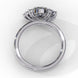 Side profile view of a white gold oval cut diamond engagement ring showing the classic four-prong head structure.