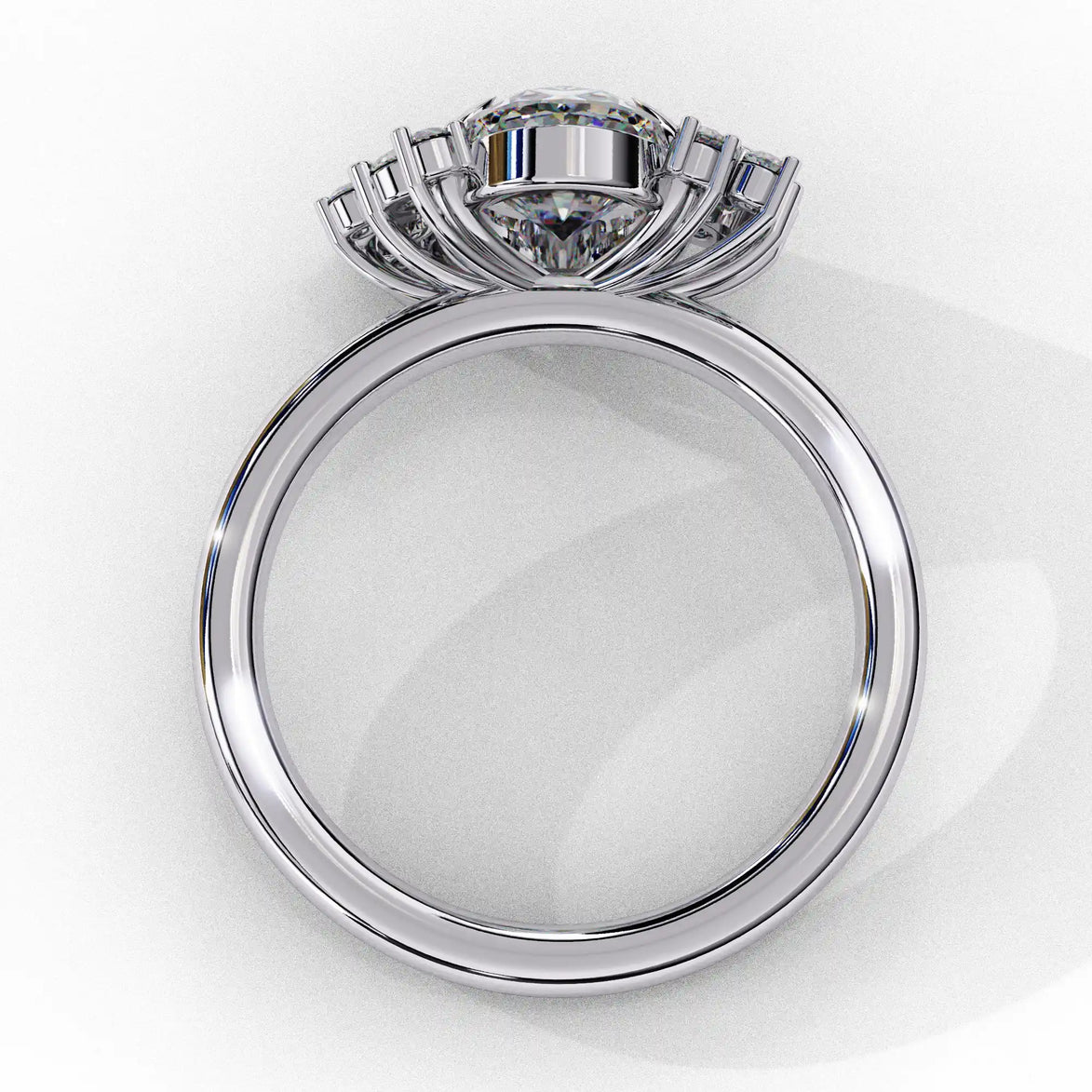 Side profile view of a white gold oval cut diamond engagement ring showing the classic four-prong head structure.