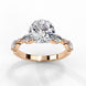 Side profile view of a rose gold round brilliant cut diamond ring highlighting the unique multi-shape accent stones along the band.