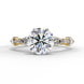 Front view of a white gold round brilliant cut diamond engagement ring with symmetrical marquise and bezel-set side stones.