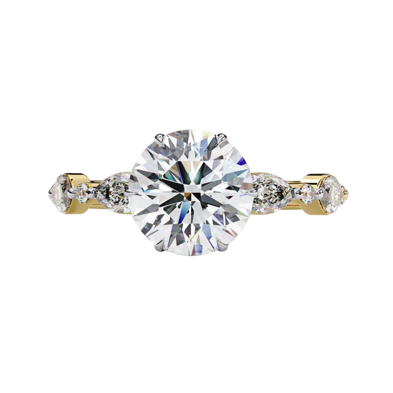 Front view of a white gold round brilliant cut diamond engagement ring with symmetrical marquise and bezel-set side stones.