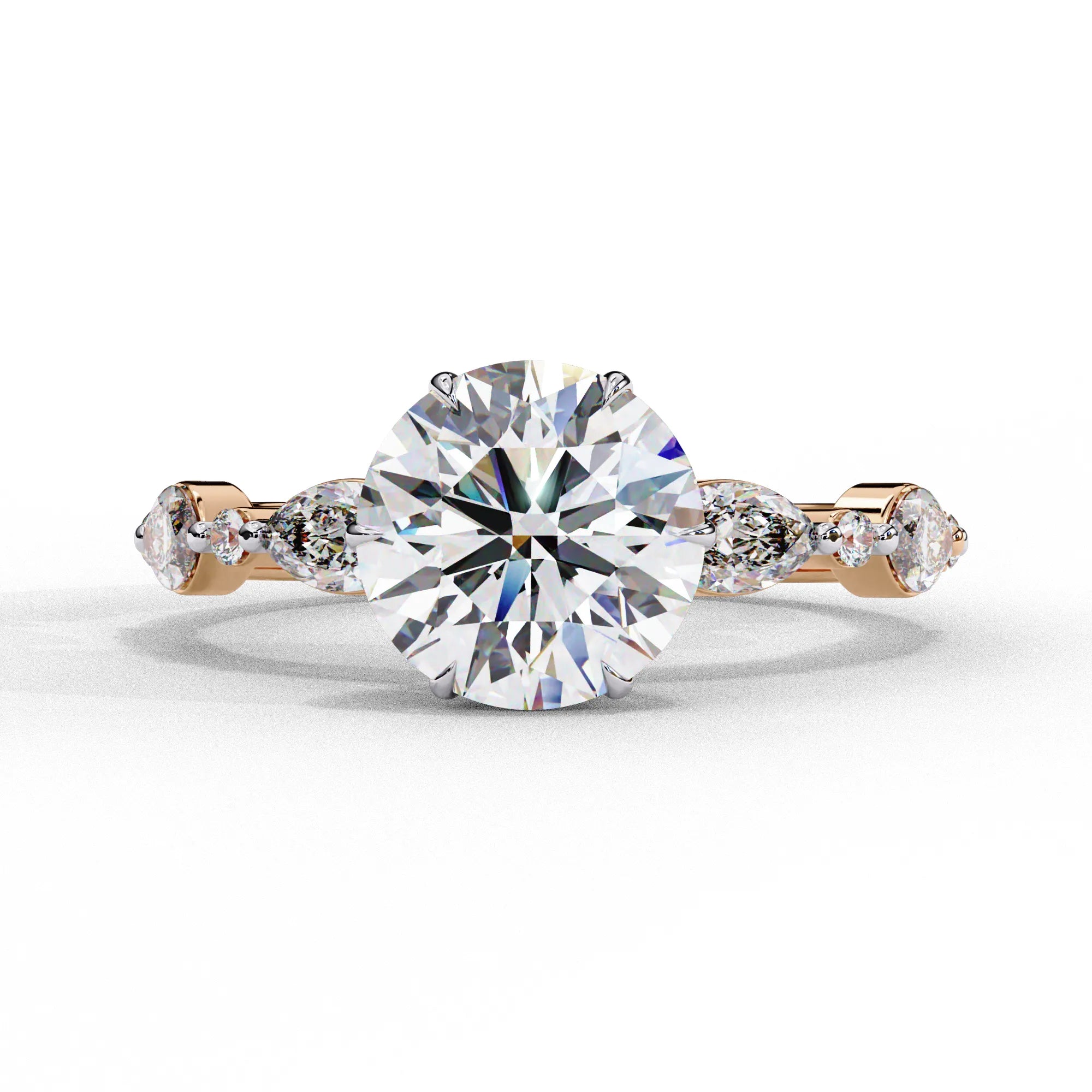 Front view of a rose gold round brilliant cut diamond engagement ring with symmetrical marquise and bezel-set side stones.