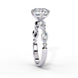 Side profile view of a white gold round brilliant cut diamond engagement ring showcasing an elegant cathedral gallery profile.