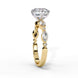 Side profile view of a yellow gold round brilliant cut diamond engagement ring showcasing an elegant cathedral gallery profile.
