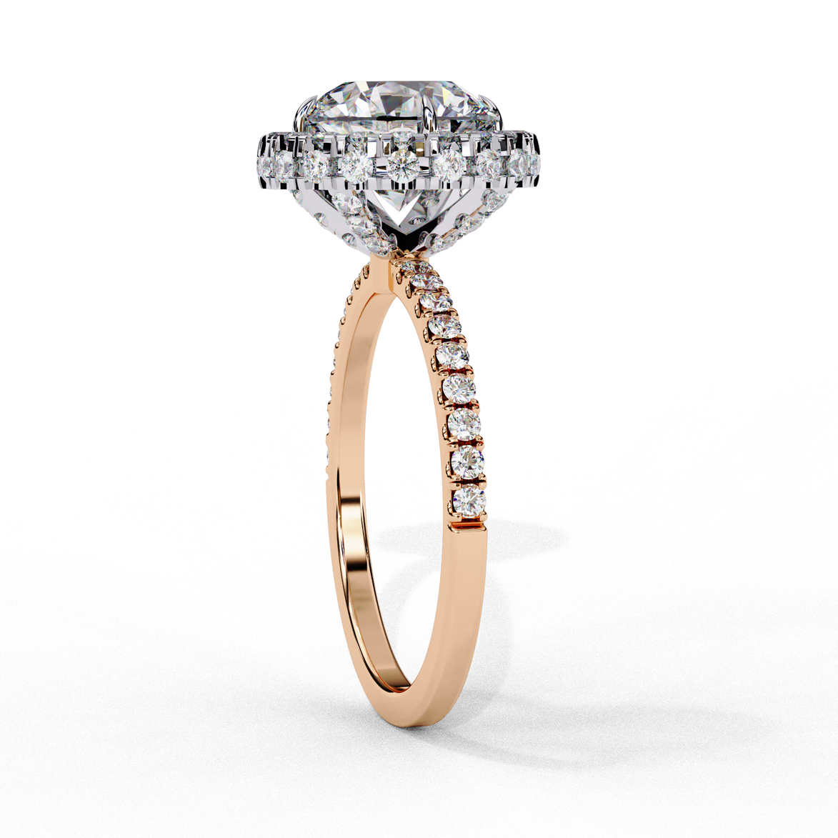 Side profile view of a rose gold round brilliant diamond double halo engagement ring showing the elevated cathedral gallery.