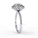 Side profile view of a white gold round brilliant diamond double halo engagement ring with a cathedral setting.